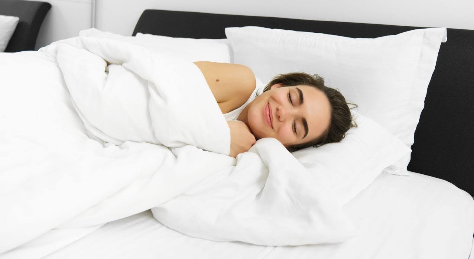 Woman in cool sheets